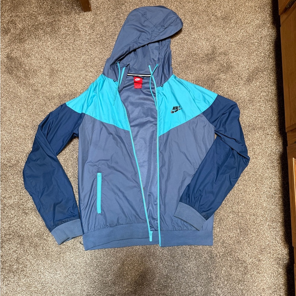 Vintage Nike Gray Hooded Windbreaker with Teal Trim and Red Tag